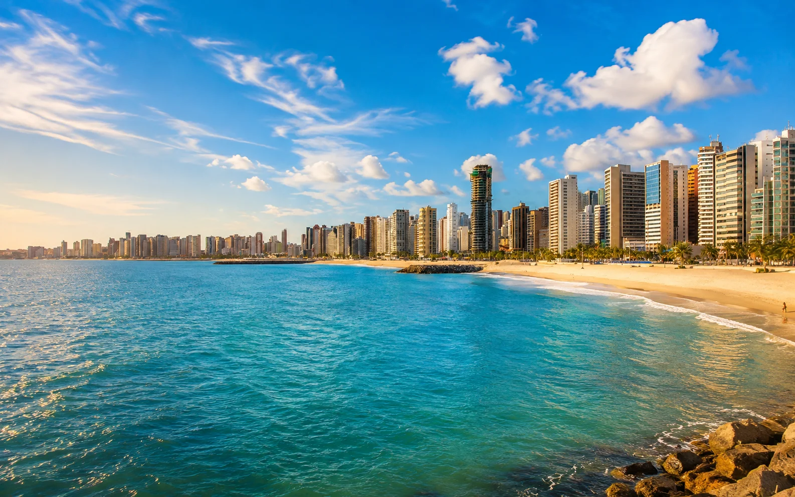 Meireles beach and Beira Mar waterfront promenade in Fortaleza with high-rise buildings