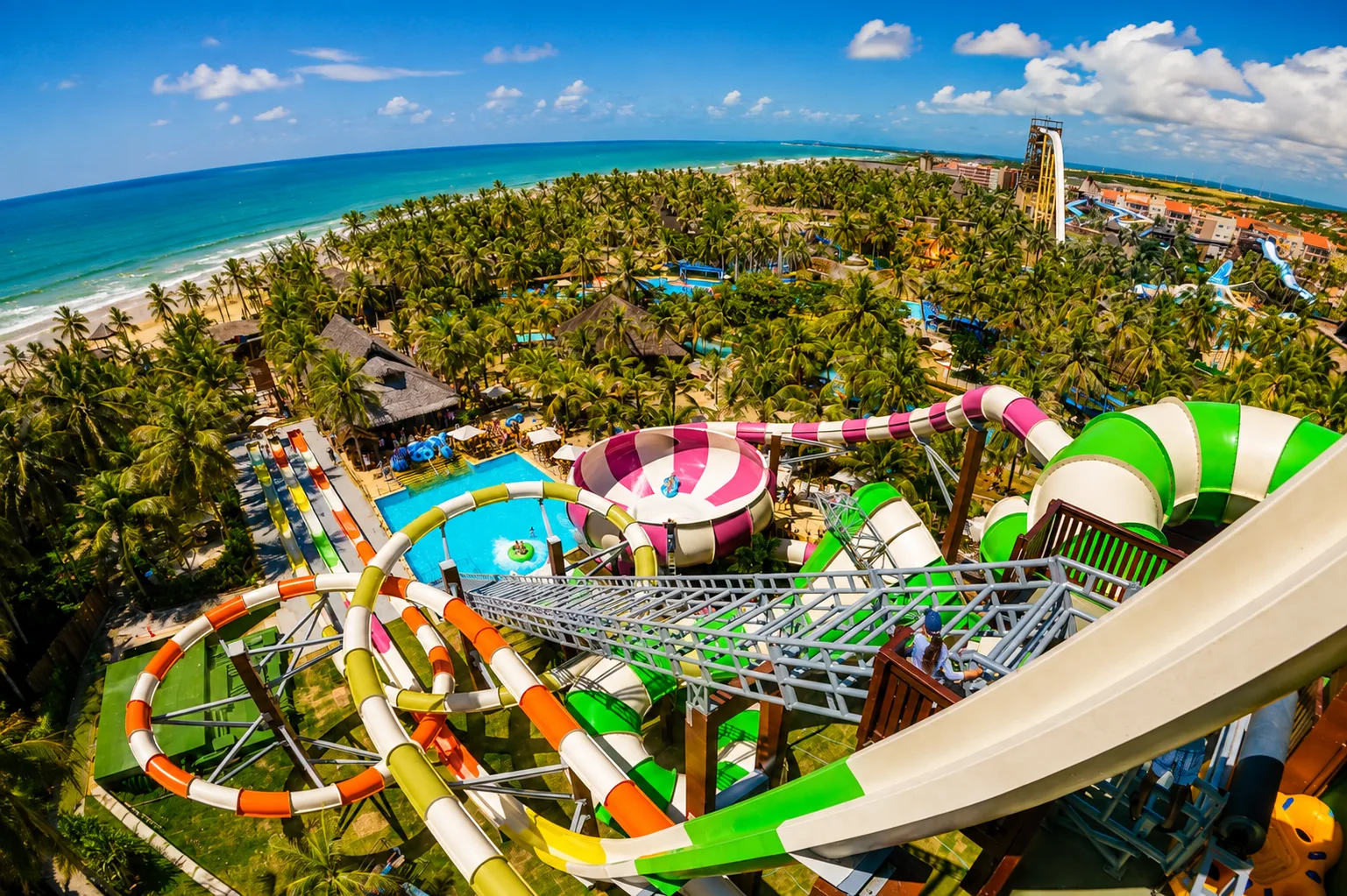 Aerial view of Beach Park water park in Ceará with colourful slides and the Atlantic Ocean